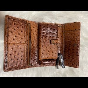 Snake skin material wallet with phone carrier and scrap that attached .